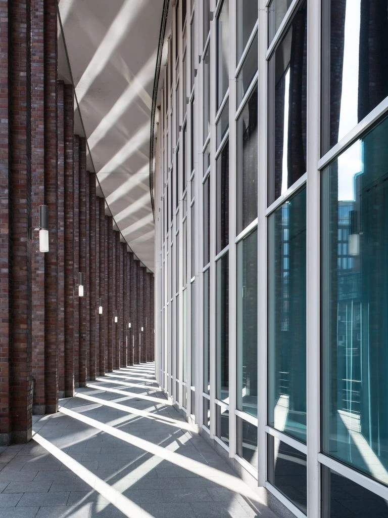 A continuous linear LED profile recessed into the ceiling of a contemporary residence.