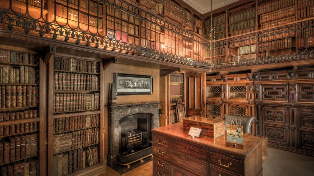 Recessed coffer lighting in a private oak-panelled library